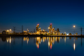 Fototapeta na wymiar Israel Nesher factory reflection at night
