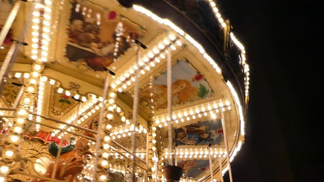 A beautiful detail of a carousel in the night