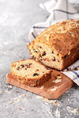 Fresh and delicious raisin bread on light background