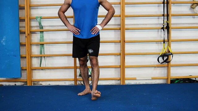 still shot of ankle exercises based on gymnastics fitness elements