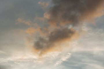 Beautiful sunset sky above clouds with dramatic light