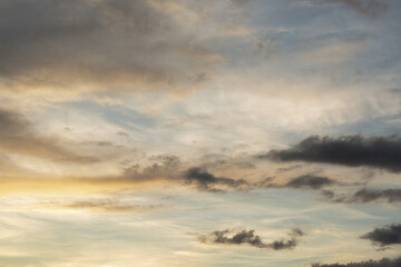 Beautiful sunset sky above clouds with dramatic light