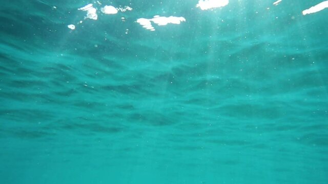 The slow motion of the water surface creates a beautiful bokeh effect. when water flows down from the lens, interesting optical effects and caustics are created.	