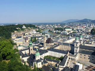 Fototapeta premium View of the old town and the Salzach river, seen from mountain in Salzburg, Austria 