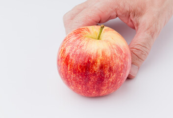 Red apple, with white background. Asturias, Spain