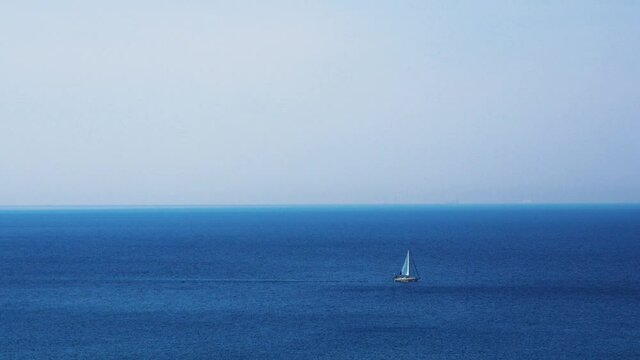 A lonely sailor on the Ligurian sea