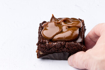 Brownie cake with sweet, white background, Spain
