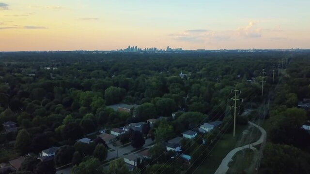 City in the distance with vertigo effect from drone at dusk