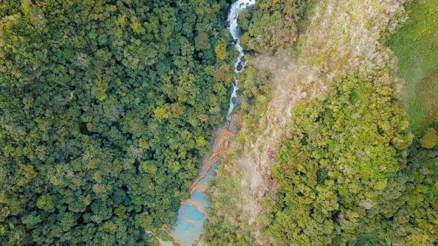 Flying over winding Semuc Champey river and pools in Guatemala, AERIAL TOP VIEW
