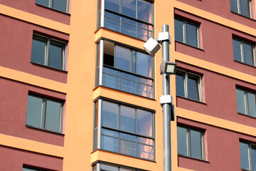 Modern street lamp on the background of the facade of the house