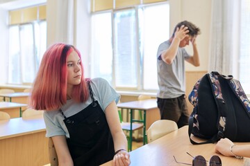 Trendy girl teenager school student in the classroom