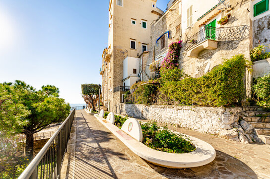 Sperlonga, Italy. Benches decorate with multicolored ceramics along Via Ripa.