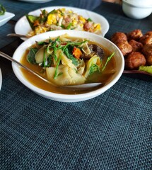 Northern Thai food, bamboo shoot curry with sweet vegetables served in white bowl