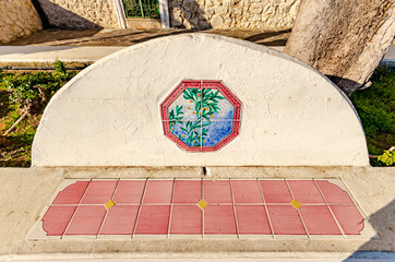Gaeta, Italy. Benches decorate with multicolored ceramics along Via Ripa.
