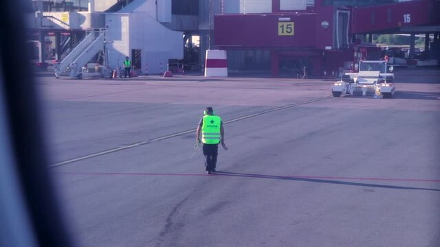 Airport worker doing his business