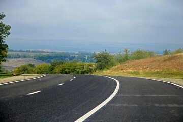 Fototapeta premium Highway landscape without moving cars at daytime