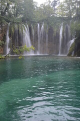 The turquoise waters from the stunning waterfalls in the Plitvice Lakes National Park in Croatia