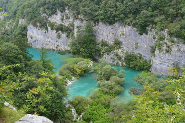 Fototapeta na wymiar The turquoise waters from the stunning waterfalls in the Plitvice Lakes National Park in Croatia