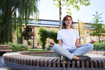 Calm woman practices yoga