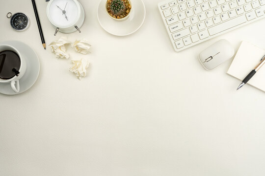 Office desk table of Business workplace and business objects on white leather background.