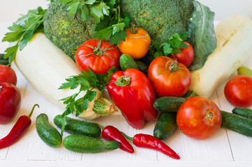 Different fresh vegetables on the table, fresh vegetables as background