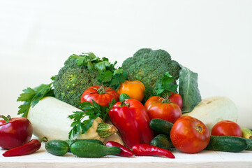 Different fresh vegetables on the table, fresh vegetables as background