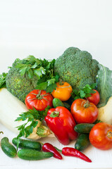 Different fresh vegetables on the table, fresh vegetables as background