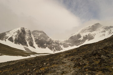 Obraz premium Hiking and climbing Kebnekaise, Sweden's highest peak, in Lapland