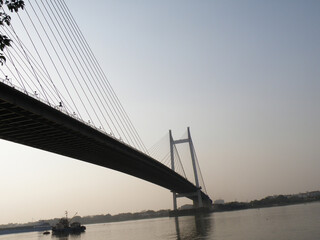 Fototapeta na wymiar Second Hooghly Bridge in Kolkata, its a very known landmark for the city of Calcutta.
