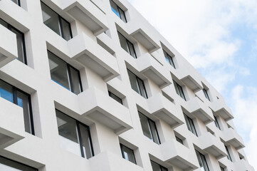 Facade of a modern building with balconies.