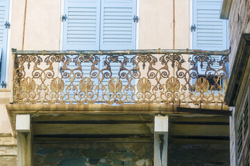 wrought iron and rusty balcony in Ermoupoli, Syros island Greece