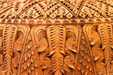 Pottery is beautifully carved and textured. The outer surface of red pottery.