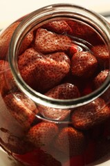 Delicious compote with strawberries in a jar