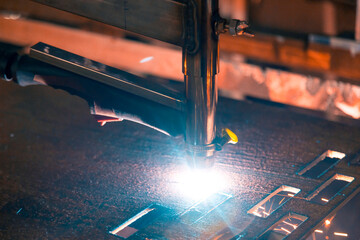 Plasma cutting of steel on a rack