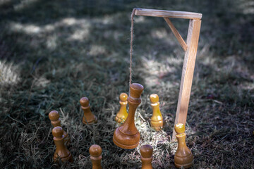 The pawns were executed by hanging their king. The concept of revolution, uprising, killing the king