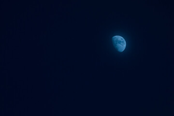 Half moon blue in the sky at night for background