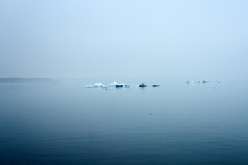 single small Icebergs in Jokulsarlon, blue cold lake