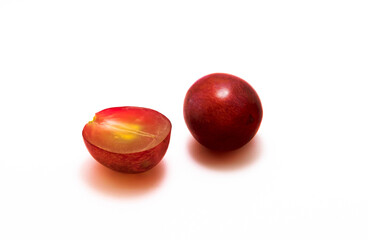 Red grapes in a cut on a white isolated background