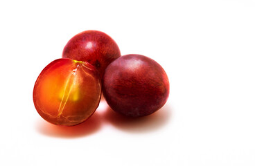 Red grapes in a cut on a white isolated background
