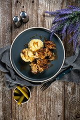 Fried liver with onion.