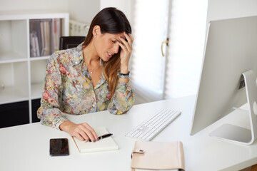 tired businesswoman  - head pain