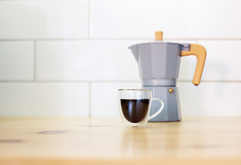 coffee maker and cup