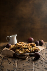 Traditional homemade plum pie with streusel