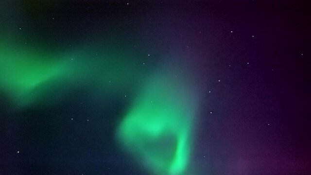 heart shaped aurora borealis high in the sky
