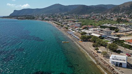 Aerial drone top down photo of organised crystal clear sea beach in Mediterranean popular destination