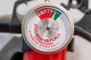 Close up of the dial on a home fire extinguisher