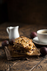 Traditional homemade plum pie with streusel
