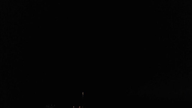 Aerial footage of fireworks over water. Rhine, Hesse, Germany.