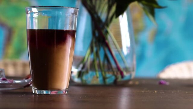 Here we see the mesmerizing flow of the milk in coffee that nearly captures your sight before you drink it.