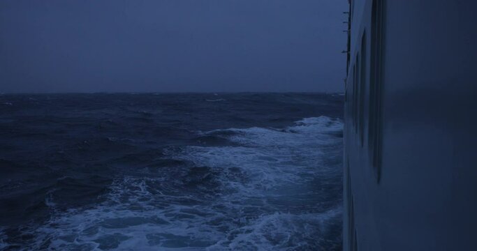 Slow motion imagery of crossing the Drake Passage to Antarctica in a storm. A dramatic scene with heavy wind and big waves. Shot in 4k with RED Epic Dragon.